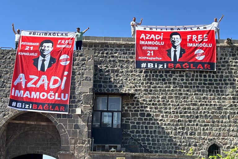 Sezgin Tanrıkulu paylaştı; İmamoğlu’nun posteri, Diyarbakır surlarında